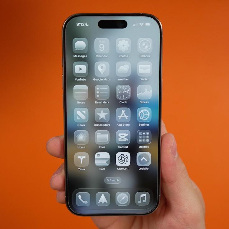 Mobile app project planning workspace with devices and development tools
